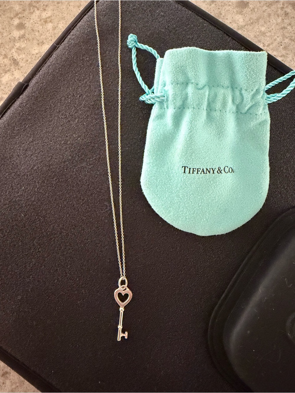 Tiffany & Co. Silver Heart Key Pendant Necklace with Blue Pouch